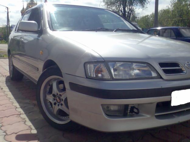 Nissan Primera P11: 8 фото